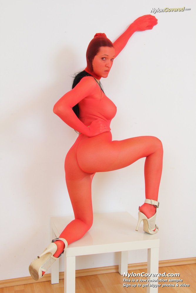 Busty model ema black face deformed by a nylon mask 2